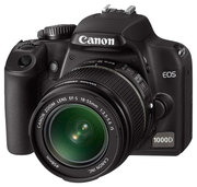 Продам зеркальный фотоаппарат Canon EOS 1000D 